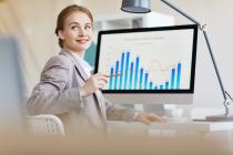 woman sitting in front of computer