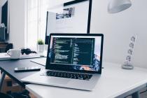 An image of 2 laptops on a desk