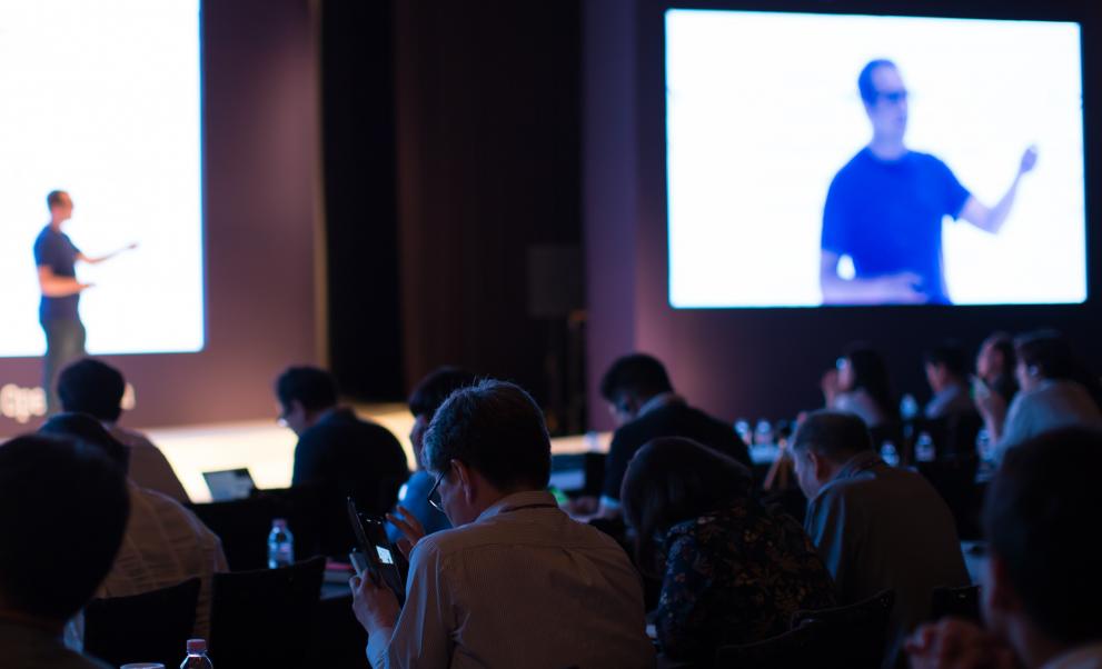 © Right 3 - stock.adobe.com Man speaking on stage at conference
