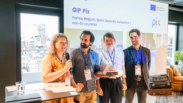 the team of Pix receiving the award