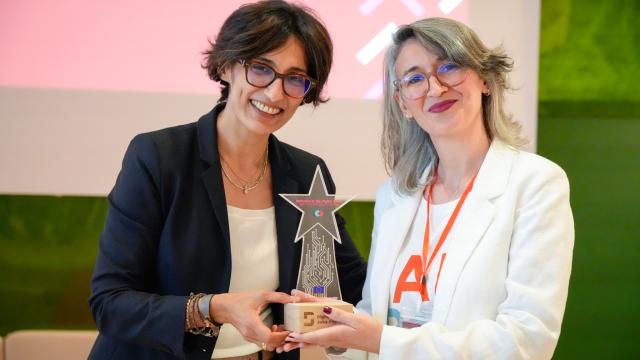 Award giving moment for ReDI School of Digital Integration representative