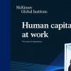 A woman opening a door: cover for McKinsey's latest report, Human Capital at work