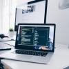 An image of 2 laptops on a desk