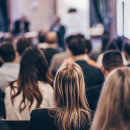 decorative image peoples at a conference 