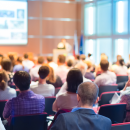 people sitting at a conference
