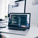 An image of 2 laptops on a desk